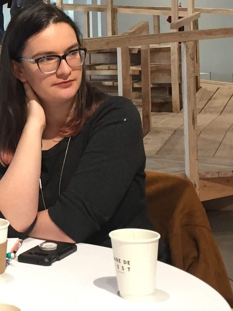 Victoria in conversation with curator Candace Hopkins in a large gallery space